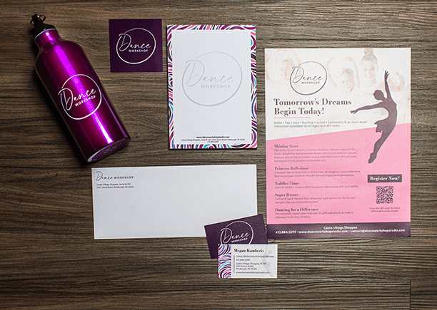 Assortment of printed collateral and a branded Dance Workshop water bottle